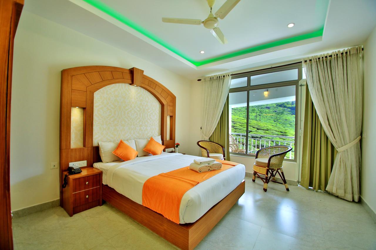 Monsoon Grande Hotel Munnar Bagian luar foto