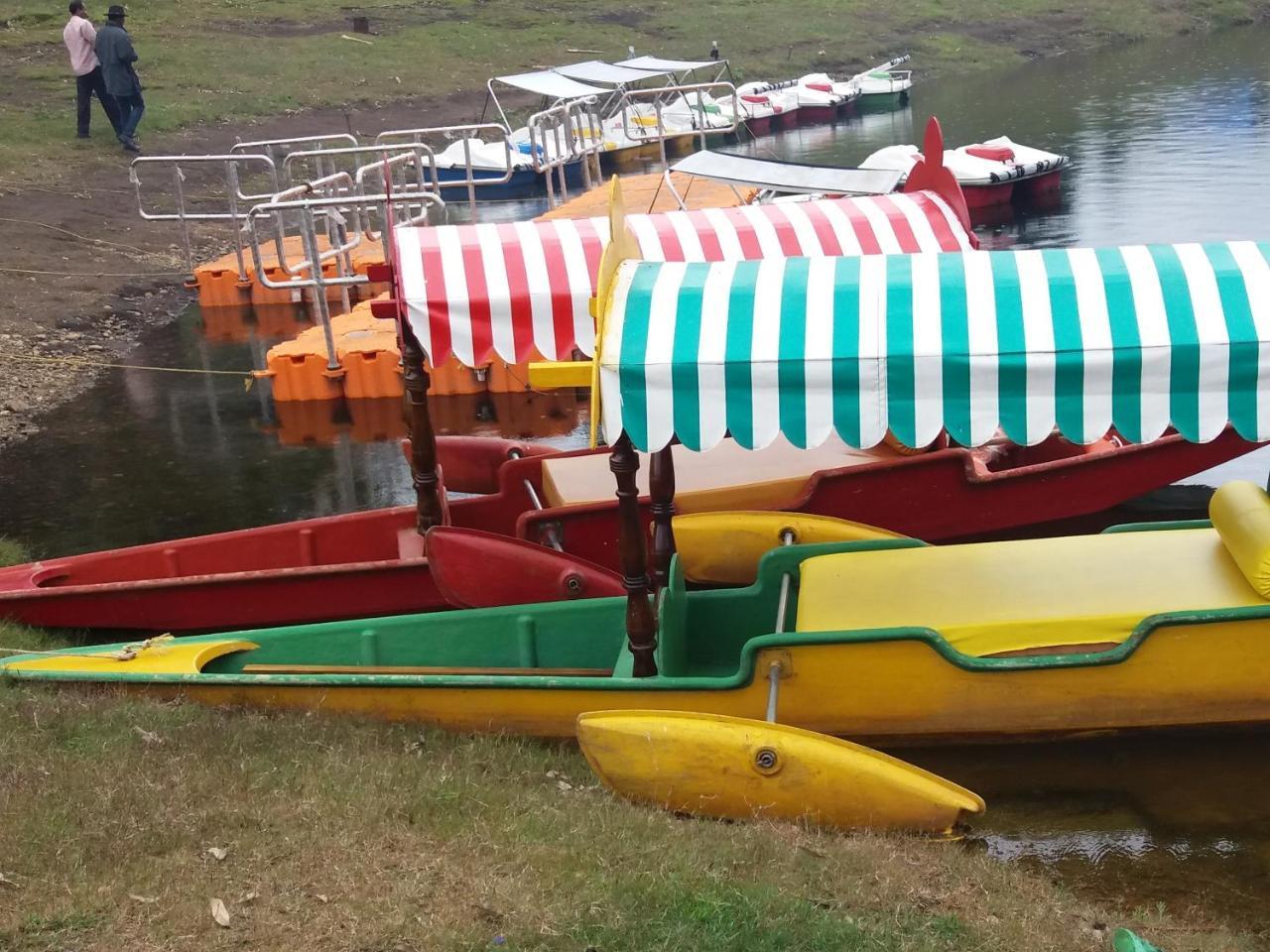 Monsoon Grande Hotel Munnar Bagian luar foto