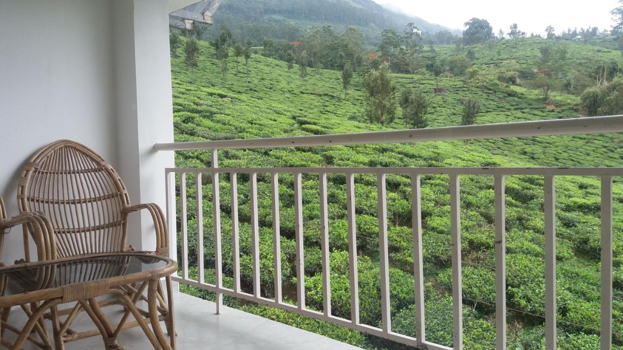 Monsoon Grande Hotel Munnar Bagian luar foto