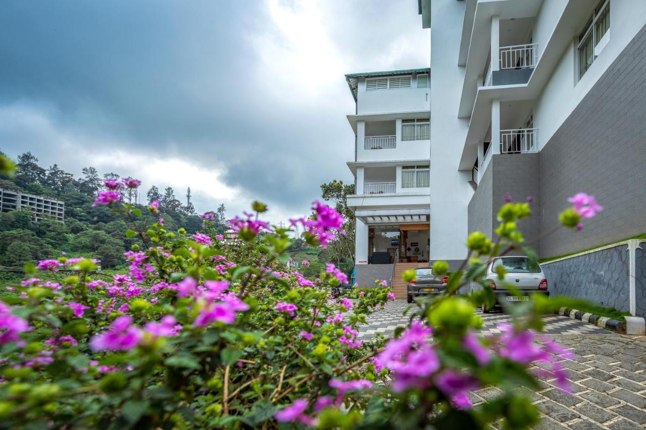 Monsoon Grande Hotel Munnar Bagian luar foto